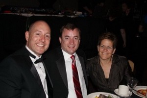 HRC64 Allen Thornell (center), with his parter, Chad Prosser, and Cathy Woolard. (Image from SoVo.)