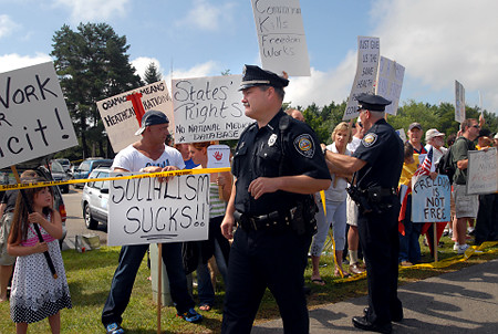 OBAMA Outside a town hall meeting on health care reform in Portsmouth, New Hampshire. (Image from Darren McCollester/Getty Images.)