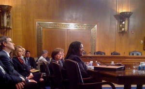 eeochrng04 EEOC Chair nominee Berrien, right, addresses the committee, as commissioner nominee Feldblum looks on.