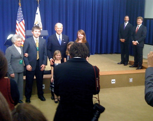 bidenfam Ambassador Huebner and his spouse, Dr. Duane McWaine, look on as Vice President Biden poses for a photo with Huebner's mother, Elizabeth, and her grandchildren following Huebner's swearing-in ceremony on Friday.